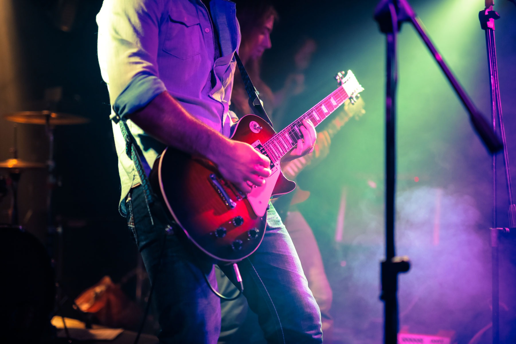 Louie's Lounge - At a concert, viewing man with guitar